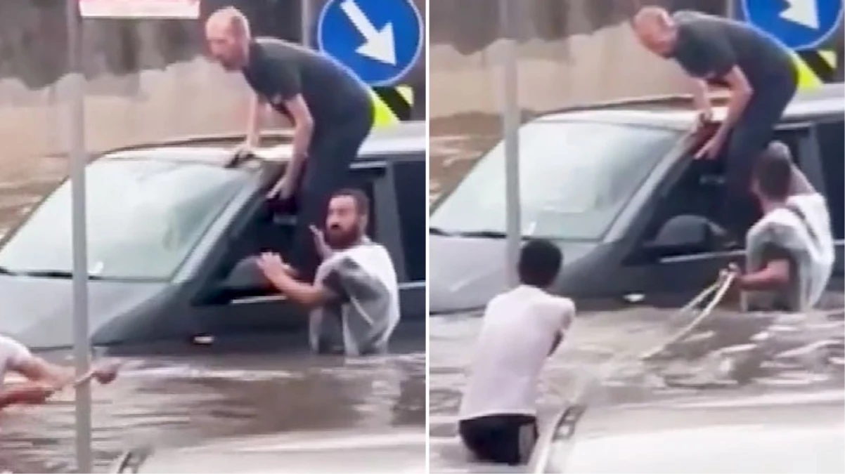 Yağışın etkili olduğu İkitelli’de aracında mahsur kalan sürücü, direğe bağlanan halat yardımıyla kurtarıldı