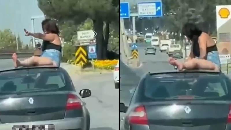 Seyir halindeki aracın kaputuna oturdu: Sosyal medyadaki görüntüler gözaltı getirdi